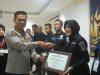 Kabid Humas Polda Sulsel Berikan Penghargaan kepada Jajaran Berprestasi dalam Rakernis T.A. 2026